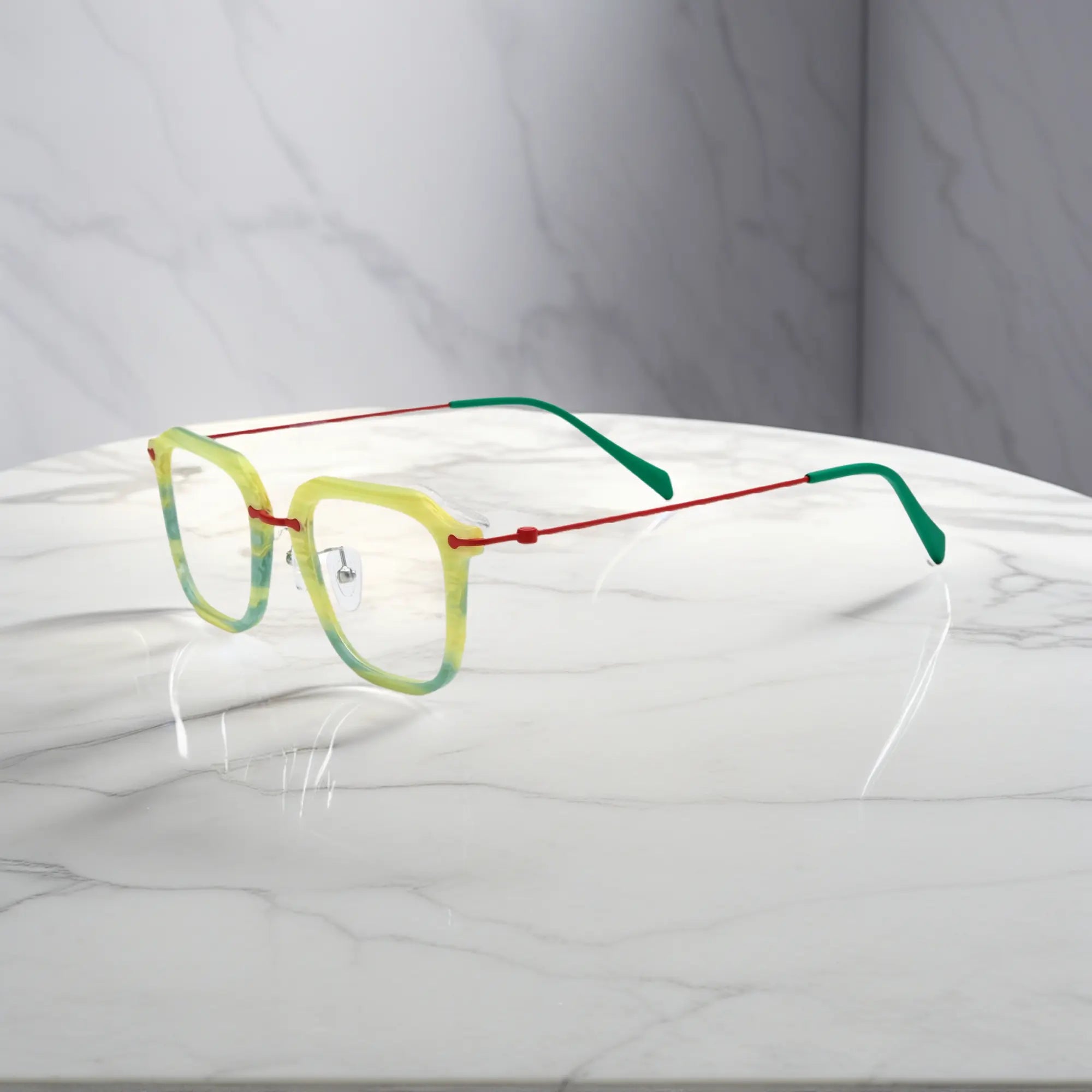 Angled side perspective showing the lightweight titanium temples and vibrant Citrus Mist colorway.